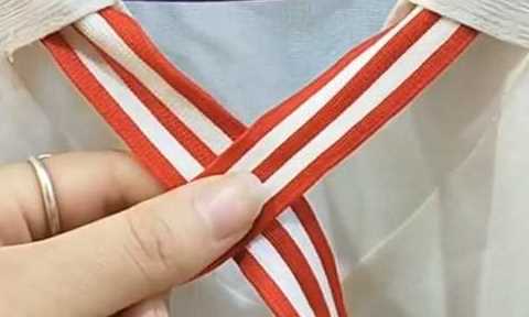 如何系蝴蝶結(jié),蝴蝶結(jié)怎么系視頻慢動作圖1
